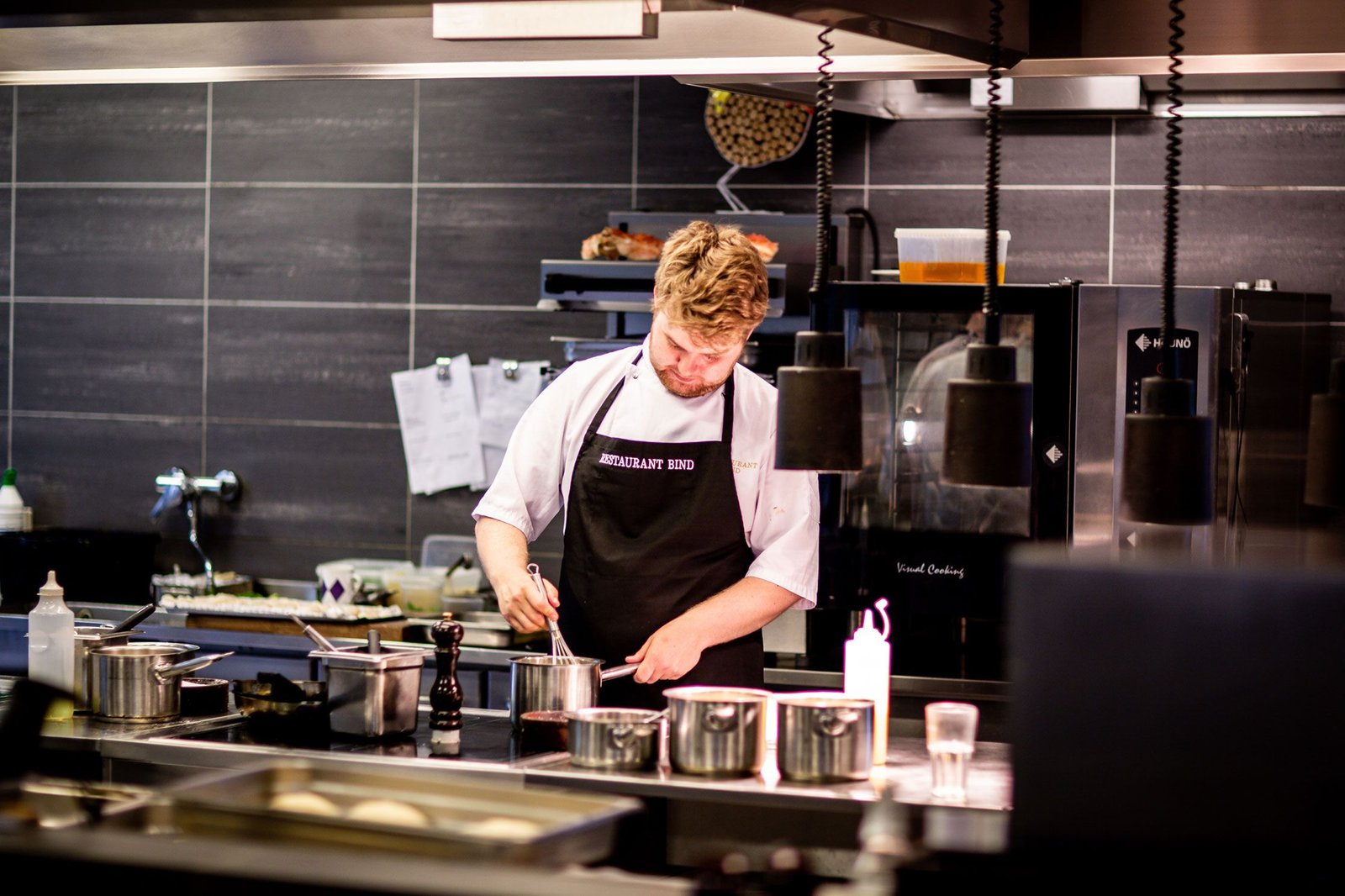 Chef Cooking in Kitchen Chef Cooking in Kitchen